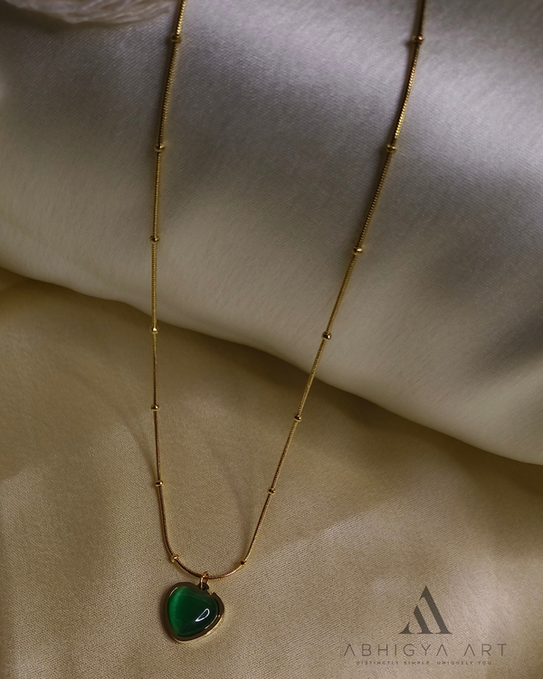 Emerald Heart Glow Pendant Necklace