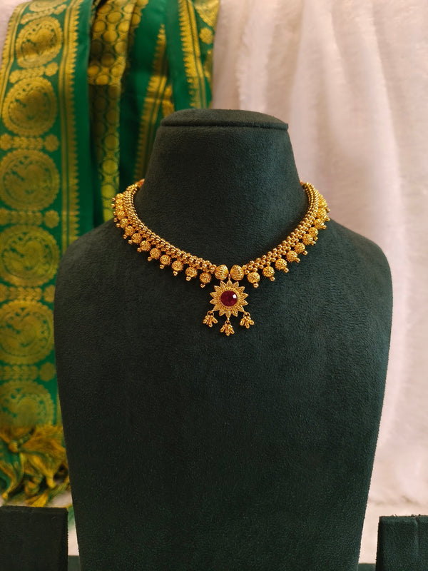 Gold Necklace with Ruby Drop Border