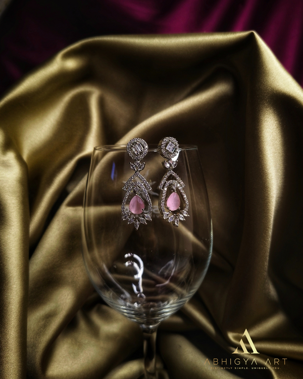 Elegant AD Earrings with Pink Stone Accent